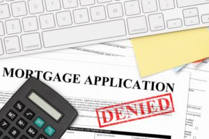 mortgage denied stamp on an application, post on how to sell an unmortgageable house.