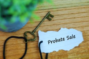 the words probate sale on a key chain - a blog about selling inherited property.