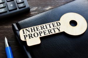 Inherited property phrase on wooden key - a blog on what to do when you inherit property from your parents